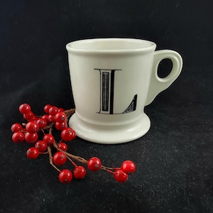 Taza con monograma de la letra L de antropología, café, té y cacao