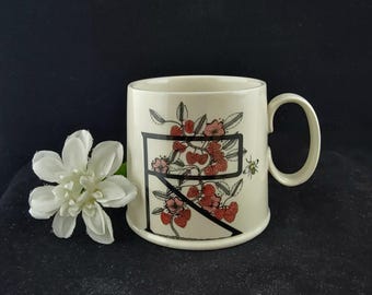 Taza con monograma Antropología R de la artista Florence Balducci