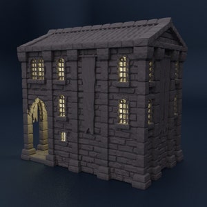 May include: A gray stone building with a pointed archway entrance and several windows. The building has a banner hanging on the side and a roof with a slight overhang.