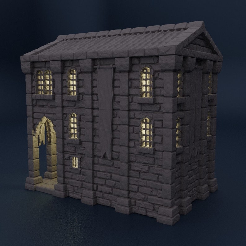 May include: A gray stone building with a pointed archway entrance and several windows. The building has a banner hanging on the side and a roof with a slight overhang.
