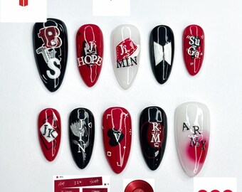 May include: A set of ten almond-shaped nail art designs in black, red, and white. Each nail features unique lettering and graphics, including the letters "BTS", "HOPE", "MIN", "JK", "RM", and "ARMY".