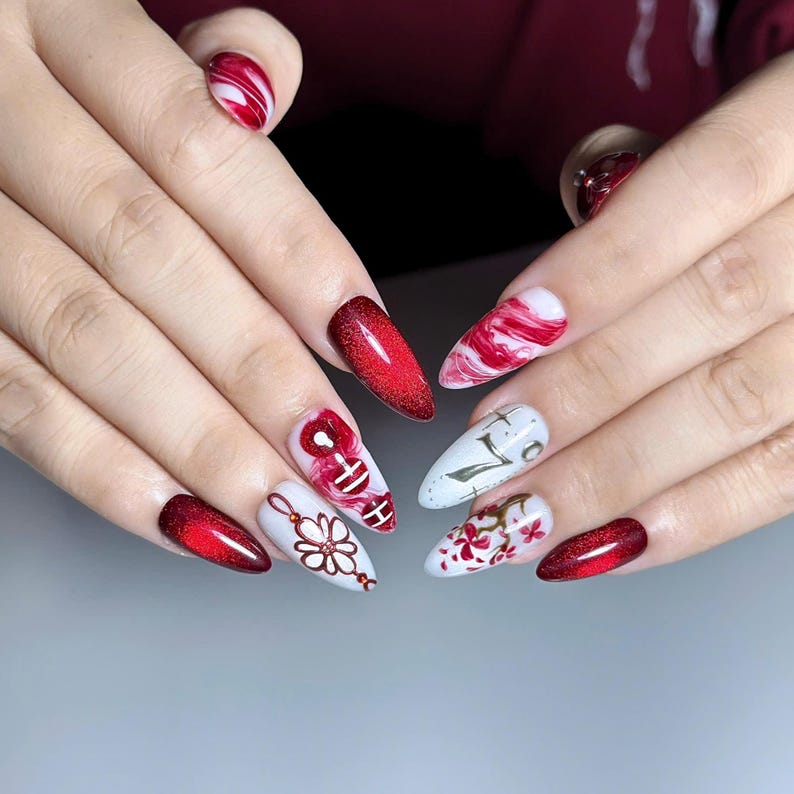 Handmade K-pop concert inspired press on nails featuring burgundy chrome gradients, glossy marble nail art, elegant floral details, concertcore aesthetic, and luxury reusable gel nails perfect for concerts, fan meetings, and music festivals.