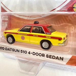 Taxi 1970 Datsun 510 4-Door Sedan - Tokyo Torque Serie 7 - made by Greenlight