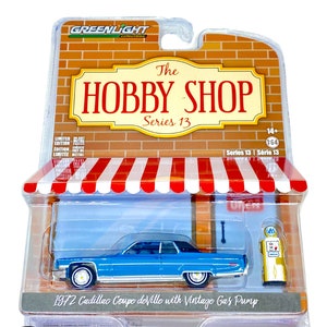 1972 Cadillac Coupe deVille with Vintage Gas Pump - The Hobby Shop Series 13 made by Greenlight Collectibles