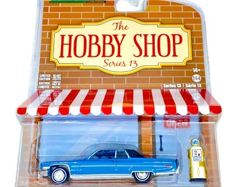 1972 Cadillac Coupe deVille with Vintage Gas Pump - The Hobby Shop Series 13 made by Greenlight Collectibles