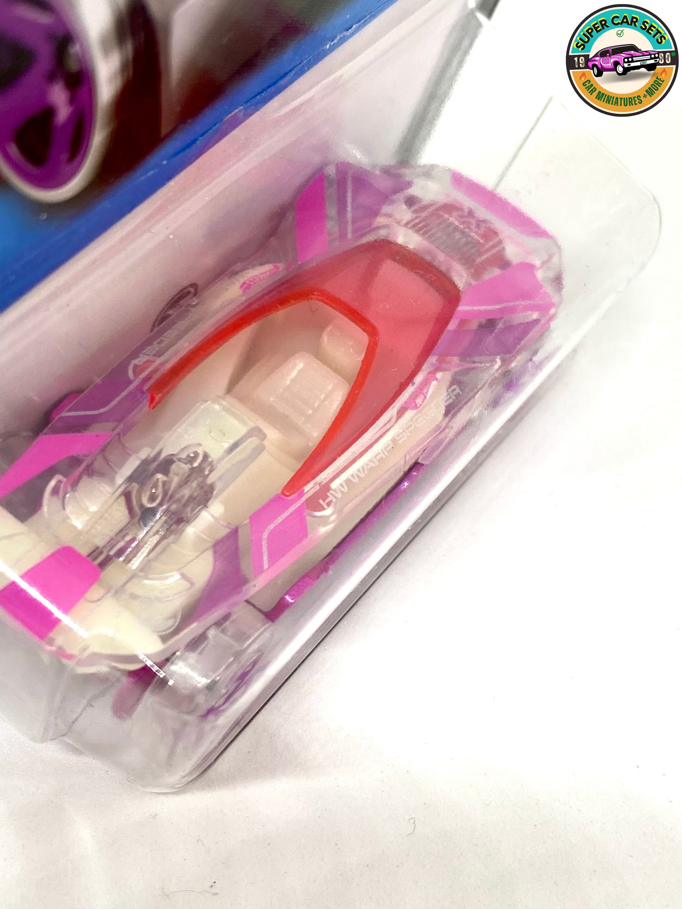 Hot Wheels Warp Speeder – Voiture Miniature échelle 1:64 – Rose