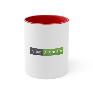 May include: White ceramic mug with a red rim. The mug features a graphic of a rating bar with five stars, four of which are green and one is grey. The text "rating" is printed on the mug.