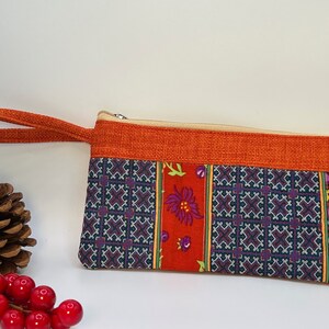 Cartera de mano estilo boho