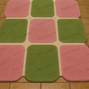 Pink and green hand-tufted runner rug arranged in a pink-green checkered grid on a tiled hallway floor.