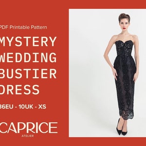 May include: A black strapless wedding dress with a fitted bodice and a flowing skirt. The dress is made of lace and has a beaded design. The dress is shown on a model with red lipstick and a sleek hairstyle. The text "MYSTERY WEDDING BUSTIER DRESS 36EU - 10UK - XS CAPRICE ATELIER" is displayed on the left side of the image.