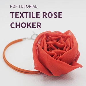 May include: A textile rose choker with a bright red fabric rose. The choker has a thin, orange-brown band and the text "TEXTILE ROSE CHOKER" and "PDF TUTORIAL". The image also includes the text "DIGITAL DOWNLOAD | STEP-BY-STEP PREVIEW".