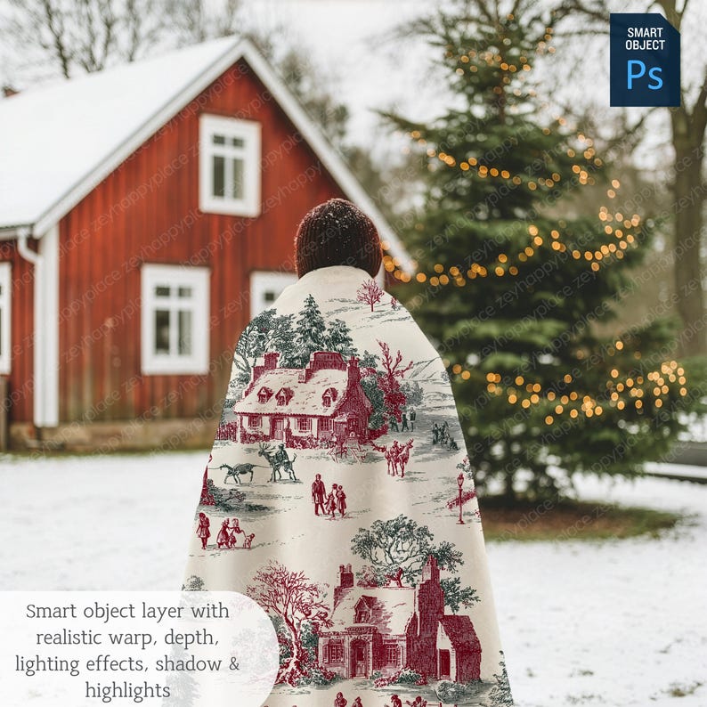 May include: A person wearing a cream-colored cape with a red and gray toile print featuring a village scene. The cape is draped over the shoulders, with a red house and a Christmas tree in the background. The text on the image says "Smart object layer with realistic warp, depth, lighting effects, shadow & highlights."
