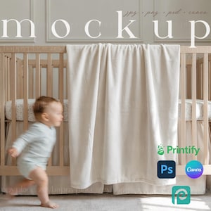 May include: A white crib with a white blanket draped over the side. A toddler is walking in front of the crib. The crib has a white and gray patterned sheet and a white ruffle.