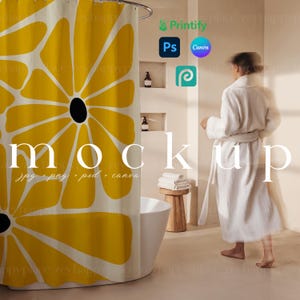 May include: A yellow shower curtain with a black floral pattern. The curtain is hanging in a bathroom with a white bathtub and a wooden stool with towels on it. The text "mockup" is written in black letters on the bottom of the curtain.