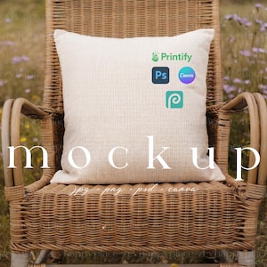 May include: A square, off-white pillow mockup with the word "mockup" in large, elegant letters. The pillow rests on a wicker chair. The image includes the logos for Printify, Ps, Canva, and a third logo. The text "jpg png psd canva" is at the bottom.