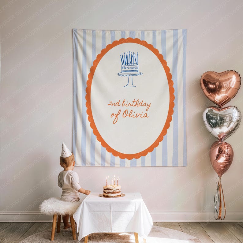 May include: A birthday banner with blue and white stripes and an orange scalloped border. The banner has a cake illustration and the text "2nd birthday of Olivia". Three heart-shaped balloons are to the right.