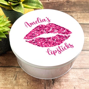 Caja de belleza de maquillaje redonda Labios de brillo rosa Lata de almacenamiento de lápiz labial personalizada