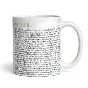 May include: White ceramic mug with a black and white design. The mug has the text "Song Title" in gold lettering and a repeating pattern of text that says "Song Lyrics Here. Any Song Lyrics You Choose. Tell Us The Artist & The Song Title And The Lyrics For That Song Will Fill This Space."