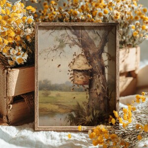 A serene spring wall art print of a beehive in a bucolic landscape, perfect for a farmhouse decor aesthetic.