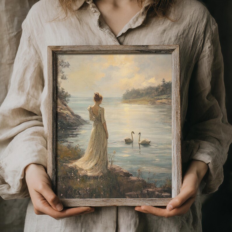 Light academia art print of a swan lake with a Victorian lady, blending soft pastels and delicate details. Suitable for vintage oil painting enthusiasts or rustic wall art collectors.
