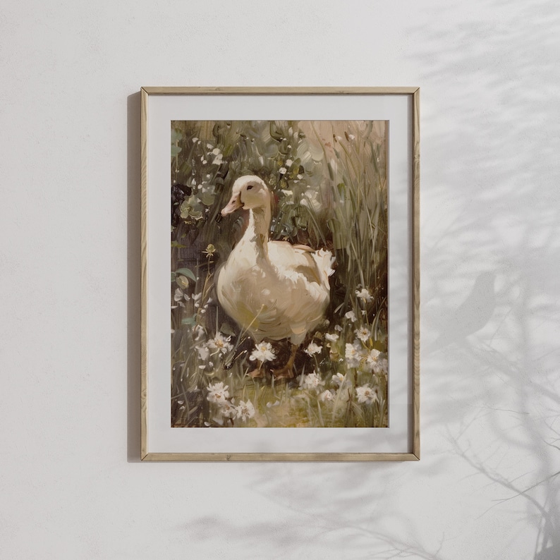 Cottagecore wall art showcasing a goose surrounded by wildflowers, blending rustic farmhouse art with a moody spring aesthetic.