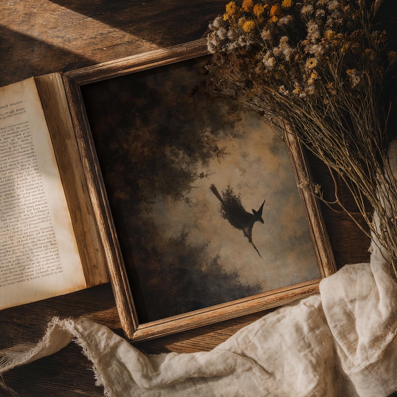 Printable wall art of a witch flying through the night sky – perfect for dark academia and vintage Halloween decor