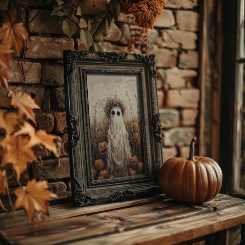Halloween wall art featuring a cute ghost and pumpkins, blending dark academia and cottagecore themes.
