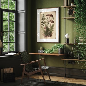 May include: A green wall with a framed botanical print of mushrooms and ferns. A wooden desk with a chair sits in the corner of the room. A shelf with plants and books is on the right side of the wall.
