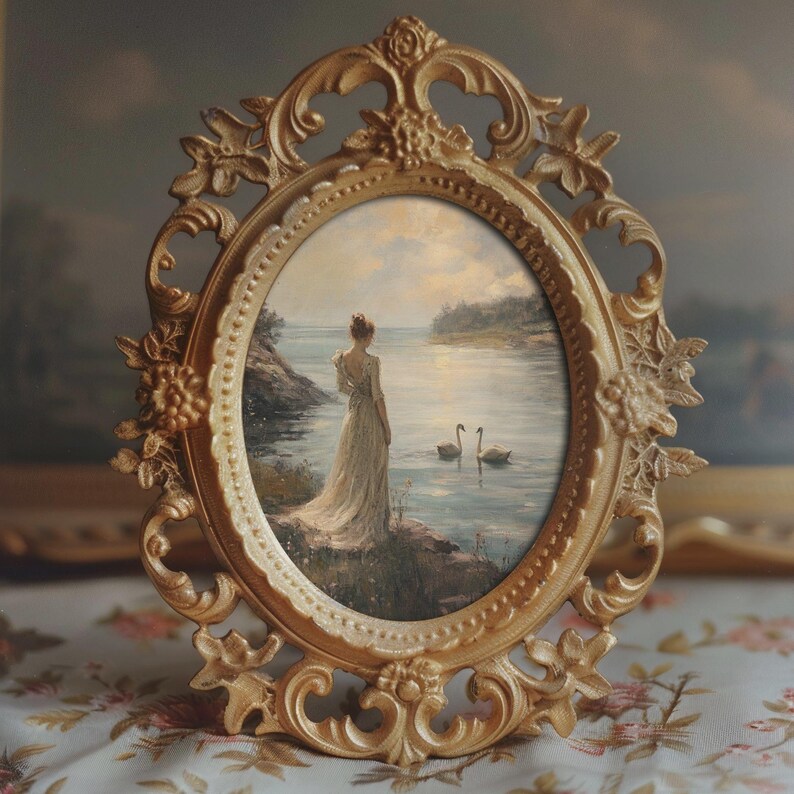 Romantic cottagecore artwork showcasing a serene lake scene with a Victorian woman and swans, in a vintage oil painting style. Perfect for spring home decor or moody farmhouse settings.