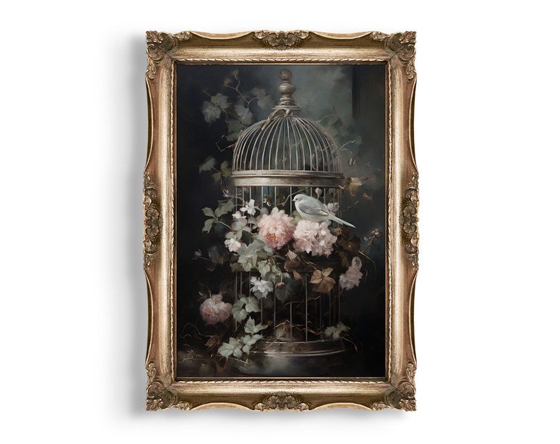 May include: A framed painting of a bird in a cage surrounded by pink flowers. The cage is made of metal and has a domed top. The bird is white and is perched on the edge of the cage. The flowers are pink and white and are arranged around the cage. The background is dark and the painting is framed in a gold frame.