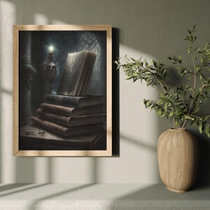 May include: A framed illustration of a stack of old books with a single open book on top. The books are illuminated by a candle in a candlestick. The background is a dark, shadowy room.