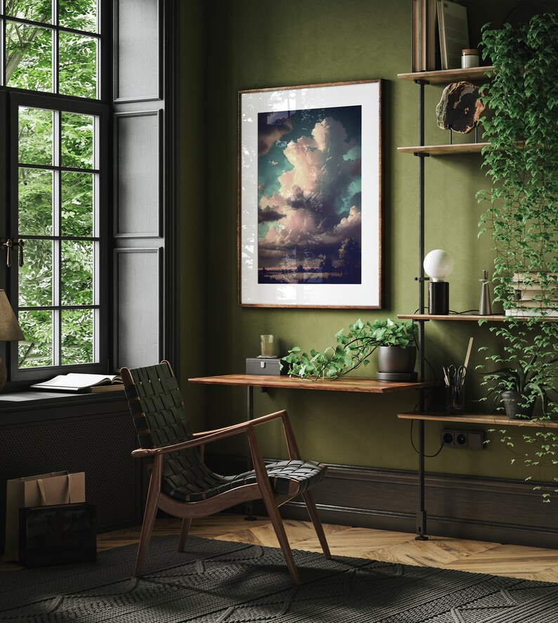 May include: A home office with a wooden desk, a black leather chair, and a framed print of a cloudy sky. The room has dark green walls and a wooden shelf with plants and books.