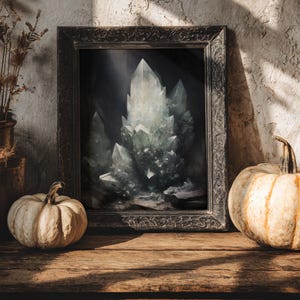 Crystal cave illustration framed in gothic ornate wood, styled with pumpkins, rustic autumn decor, goblincore aesthetic.