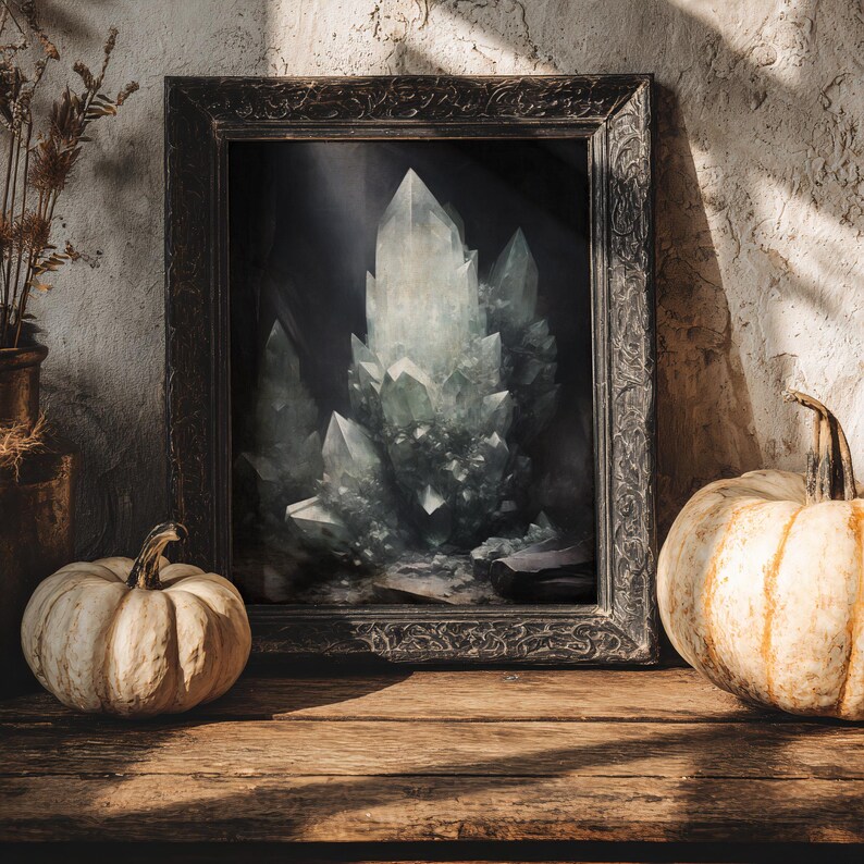 Crystal cave illustration framed in gothic ornate wood, styled with pumpkins, rustic autumn decor, goblincore aesthetic.