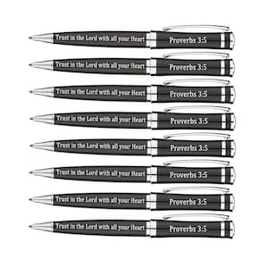 May include: Set of eight black and silver pens with the inscription "Trust in the Lord with all your Heart" and "Proverbs 3:5" on each pen.