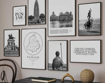 May include: A collection of framed black and white prints featuring images of Punjab, India. The prints include architectural landmarks, maps, and text. The artwork is displayed above a dark wood cabinet with decorative items.