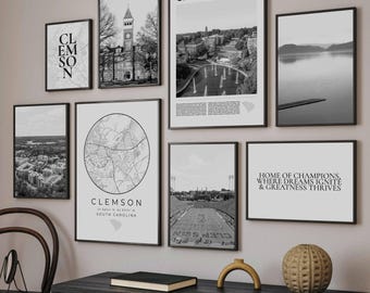 May include: Black and white prints of Clemson University, South Carolina. The prints include a map of the city, a view of the campus, and a football field. The prints are framed in black frames and are hung on a wall.