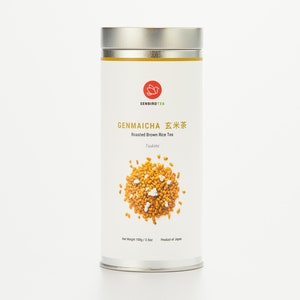 May include: A silver can of Genmaicha Roasted Brown Rice Tea. The can has a white label with a red logo of a bird in a teacup. The label also says "Genmaicha 玄米茶 Roasted Brown Rice Tea" and "Product of Japan".
