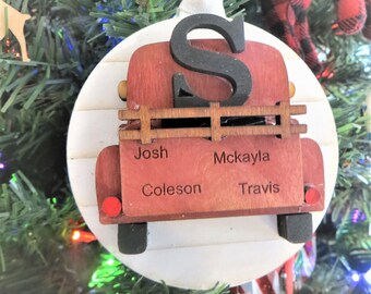 Custom Family names back of Truck Christmas Ornament