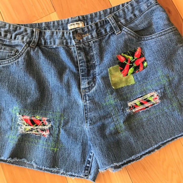 Denim jean cutoff short shorts, distressed patched 80s 90s vintage upcycled reworked fringy cutoffs, peppers trendy eye catching jeans