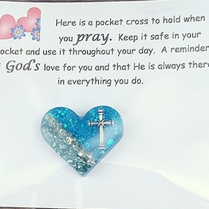 Pocket Cross in a heart shape. Made with colored broken glass and cross charms. Religious jewelry.