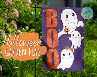 May include: A Halloween garden flag with the word "BOO" in orange letters with spiderweb designs. The flag features three cartoon ghosts and the text "Halloween GARDEN FLAG" in an orange banner.