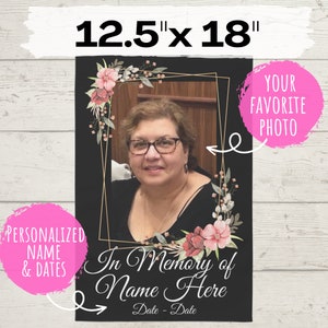 May include: A black and gold framed memorial photo template with floral accents. The template includes space for a personalized name and dates, as well as a photo. The text "In Memory of" and "Name Here" is included in the template. The template is 12.5 inches by 18 inches.
