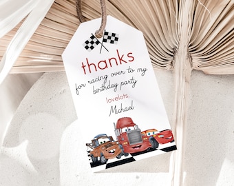May include: White thank you tag with red checkered flags, red text that says "thanks for racing over to my birthday party love lots, Michael" and a cartoon image of three red cars.