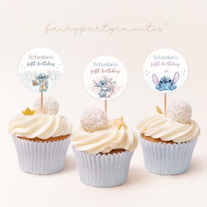 May include: Three cupcakes with blue and white frosting topped with a round sticker featuring a blue cartoon character with the text "Sebastian's fifth birthday".