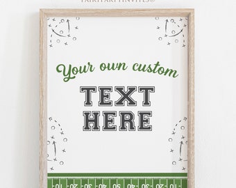 May include: A printable sign with a football field design and the text "Your own custom TEXT HERE". The sign is framed in a light brown frame.