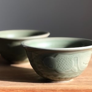 Pair of vintage celadon green koi fish bowls