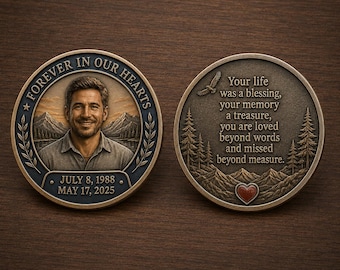 May include: Two circular bronze-toned commemorative coins. The left coin features a portrait of a man, the text "FOREVER IN OUR HEARTS," and the dates "JULY 8, 1988" and "MAY 17, 2025." The right coin displays a mountain landscape and a heart icon.