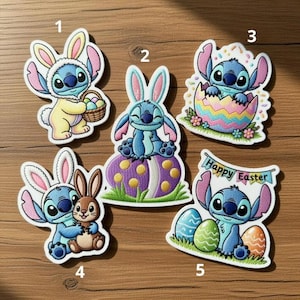 May include: A collection of five embroidered patches featuring the character Stitch from Lilo & Stitch, each with an Easter theme. The patches depict Stitch in various poses with Easter eggs, bunny ears, and baskets.