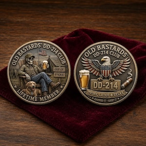 May include: Two circular metal challenge coins featuring the Old Bastards DD-214 Club. One side shows a skeleton in a chair with a dog, a beer, and a sign reading Out of F*cks. The other side displays an eagle, a beer, a cigar, and the text DD-214.